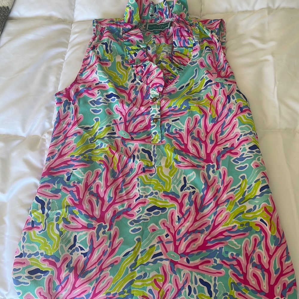 Designer ruffled sleeveless top